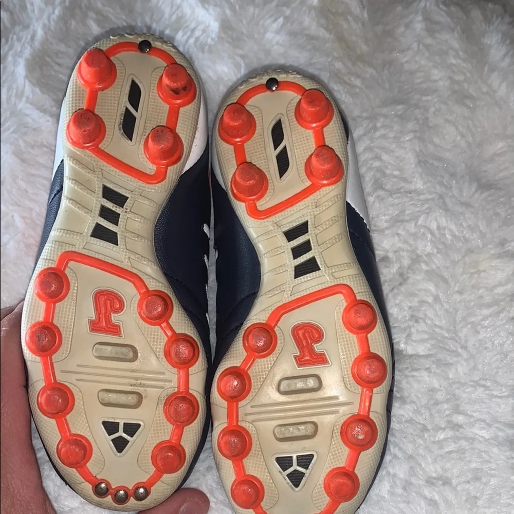 Kids Black and Orange Soccer Shoes like new